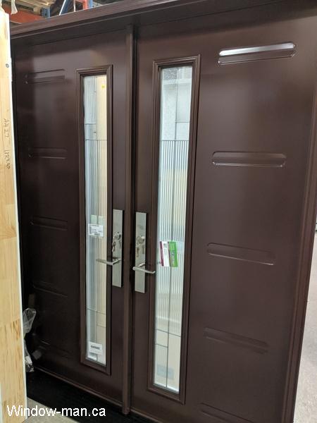Double entry steel insulated front exterior doors. 7x64 glass lights symmetrical composition. Multi point lock locking system.